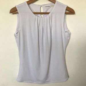 White sleeveless top